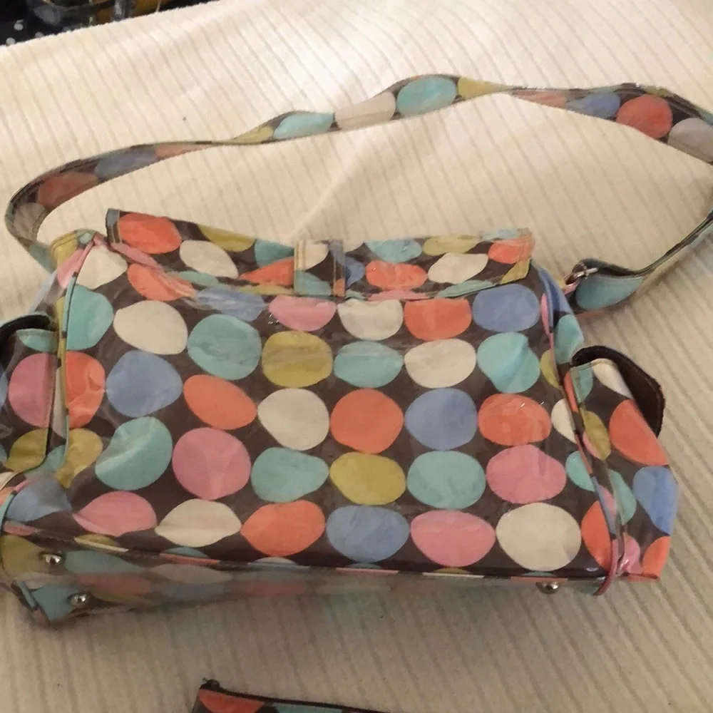 Multi colored easy wipe pokadot kalencom diaper bag